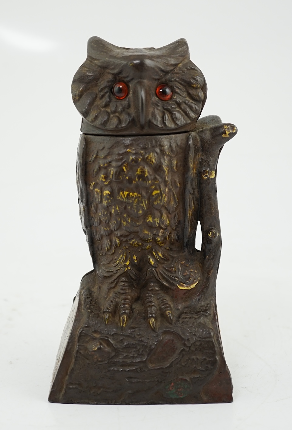 A late 19th century American cast iron owl Patent money box